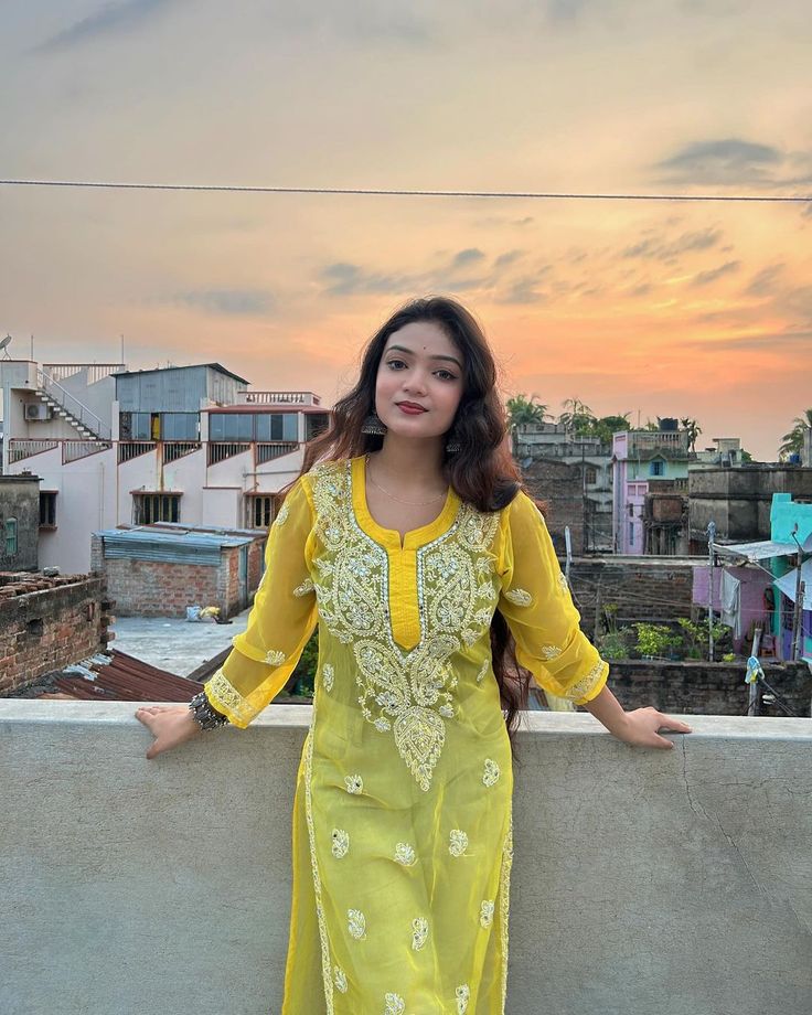 Mustard yellow embroidered kurta for festive wear, showcasing elegant ethnic design.