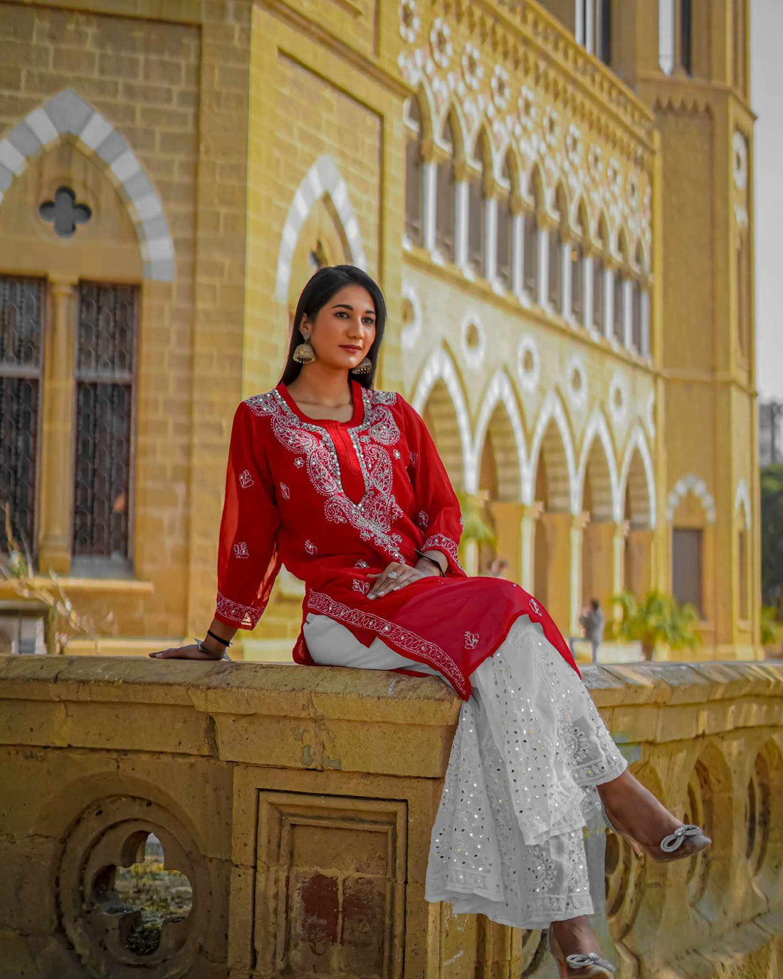 Crimson Red Embroidered Kurta - Elegant Festive & Formal Wear. A close-up shows intricate floral embroidery on a rich red